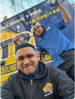 Brooklyn NY plumbers from Petri in front of billboard
