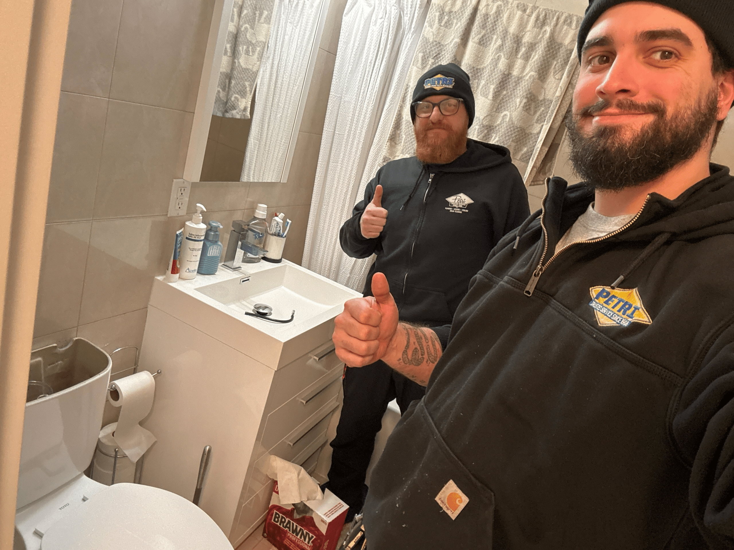 Petri plumbers in Brooklyn, NY after fixing toilet