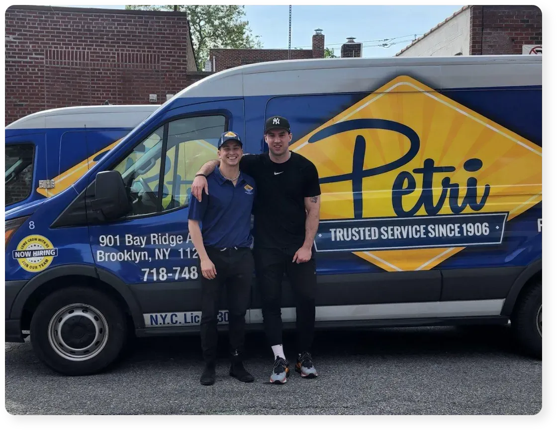 Brooklyn NY plumbers in front of Petri service van
