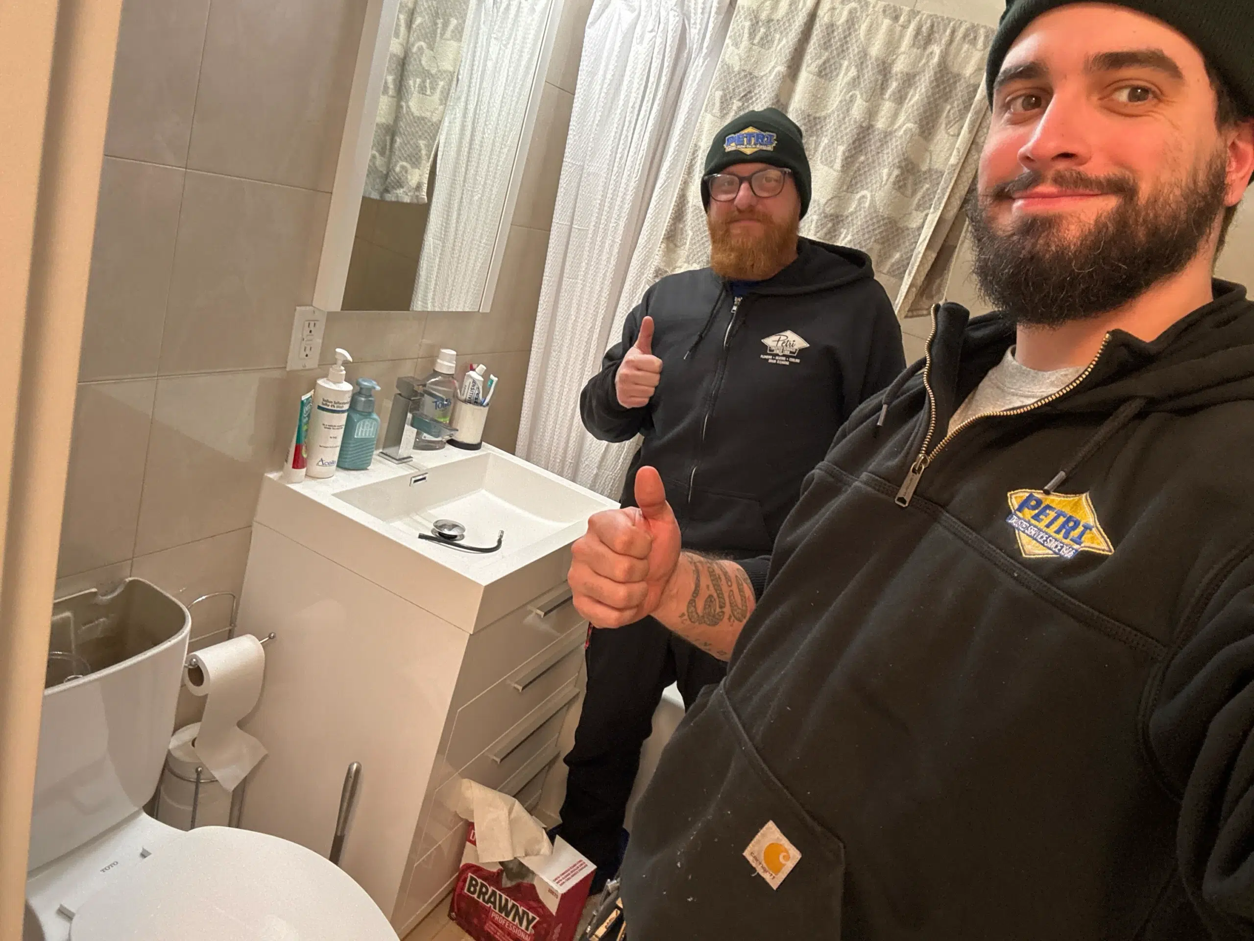 Petri plumbers in Brooklyn, NY after fixing toilet