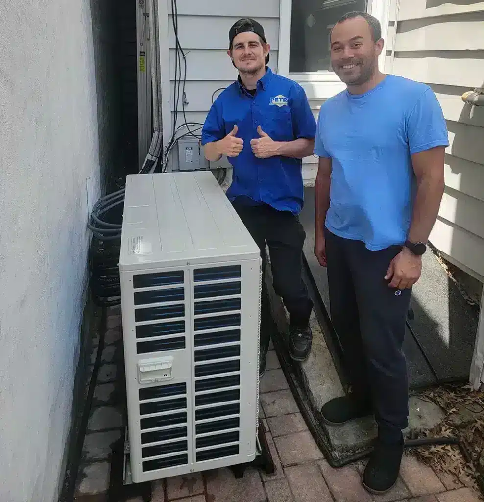 tech and customer after ac maintenance in brooklyn