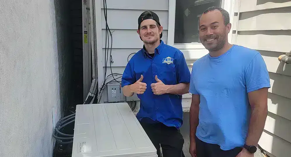 tech and customer after ac maintenance in brooklyn