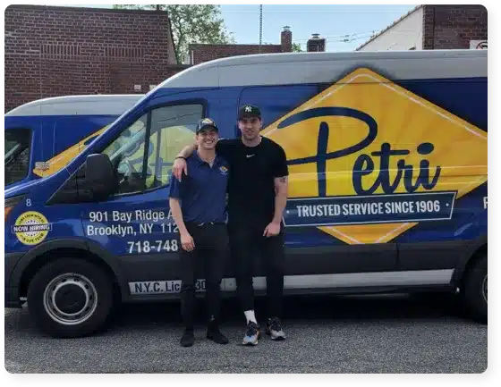 Brooklyn emergency plumbers standing in front of Petri truck