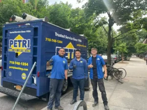Petri box truck parked in Brooklyn, NY and three Petri Technicians smiling.